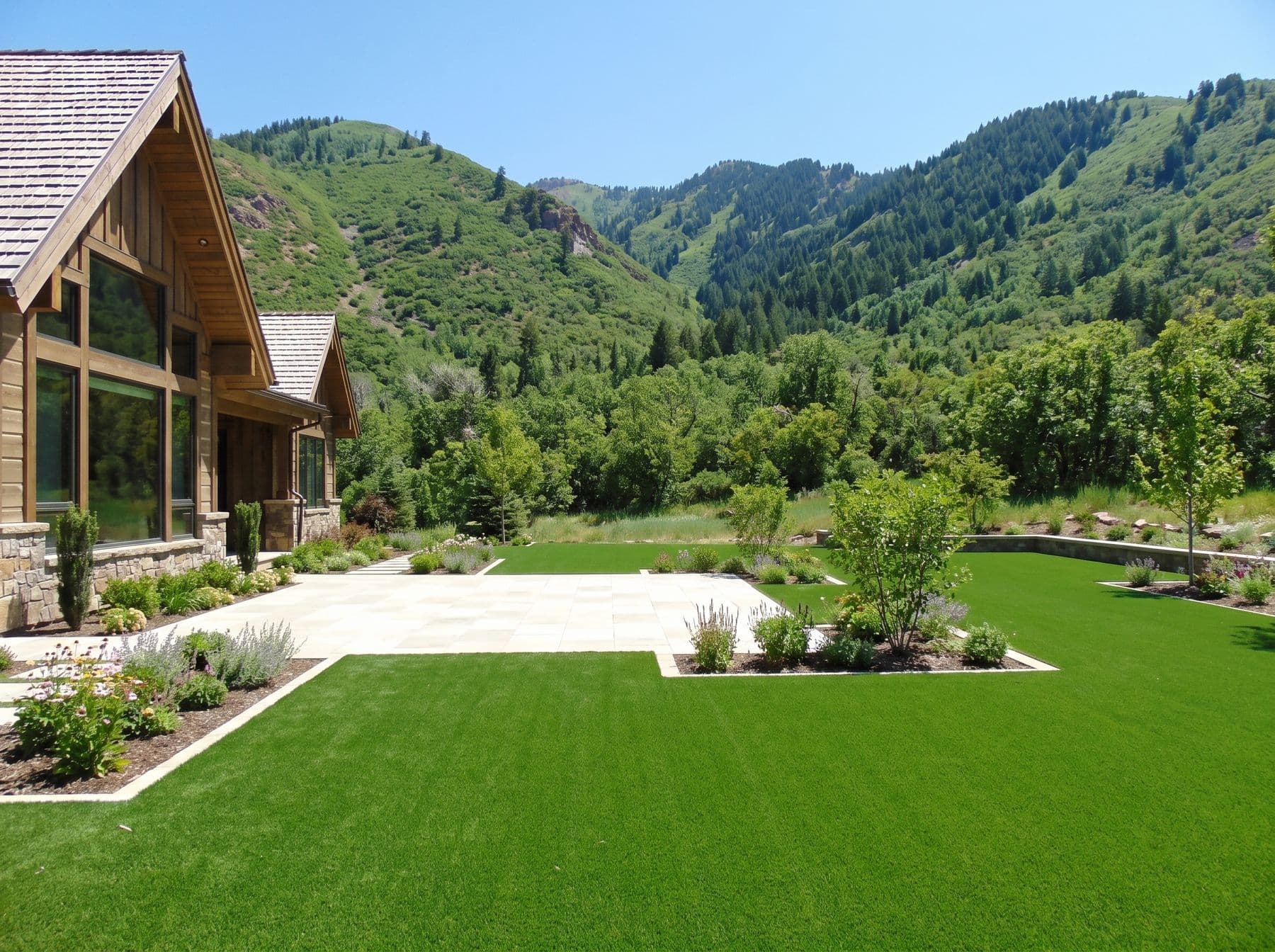 An even turf lawn and pale limestone terrace on valley ground, photographed in a Midway setting